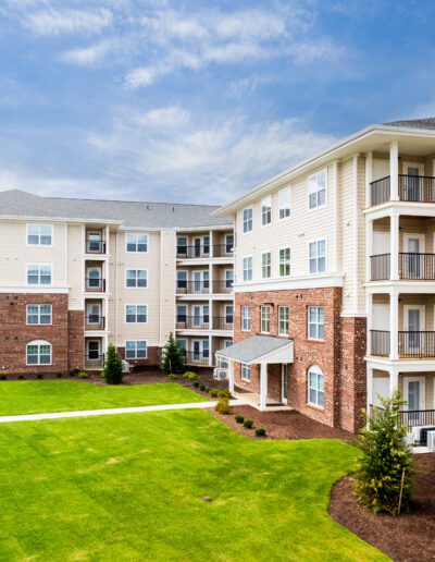 Outside VIew Of Building With Light Grass